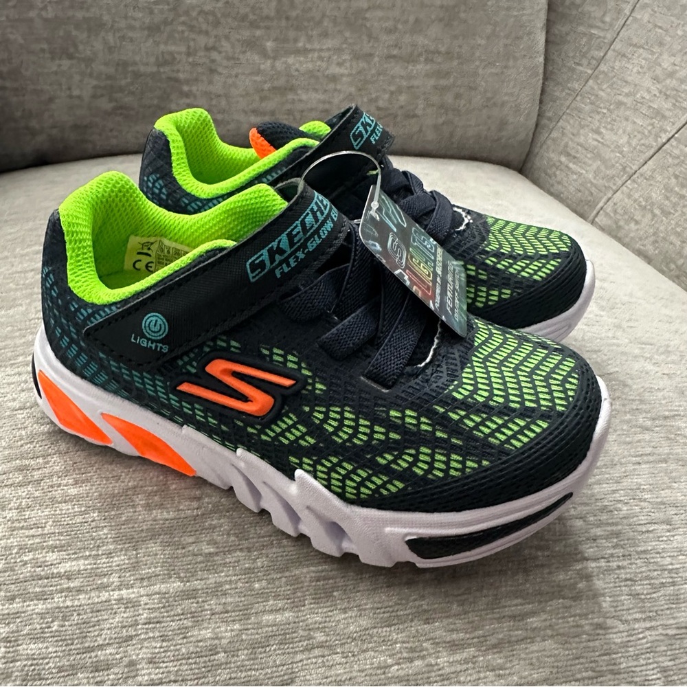 Skechers Kids Black Sneakers with Neon Green and Orange Accents Light Up
